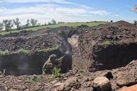 Russian servicemen attend a combat training for assault units in an undisclosed location in Ukraine