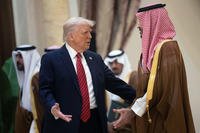 U.S. President Donald Trump speaks with Saudi Crown Prince Mohammed bin Salman