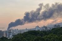 Smoke rises from the building of Iran's state-run television