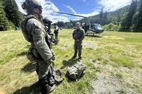 deputies participate in the search for Travis Decker, at an undisclosed location in Washington state