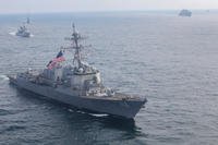 The Arleigh Burke class guided-missile destroyer USS Thomas Hudner