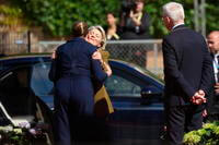 Denmark's Prime Minister Mette Frederiksen greets European Commission President Ursula von der Leyen