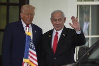 Israel's Prime Minister Benjamin Netanyahu is greeted by President Donald Trump.
