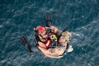 A U.S. Air Force pararescueman assigned to the 82nd Expeditionary Rescue Squadron recovers a simulated patient during a joint training with the Marine Medium Tiltrotor Squadron 161 (VMM-161) in Djibouti, Aug. 4, 2025. As part of the 449th Air Expeditionary Group, the 82nd ERQS serves as the task force responsible for conducting personnel recovery operations in East Africa.