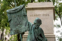 A plinth that once held a statue of Confederate general Albert Pike