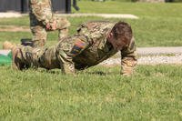 Sgt. Alexander Otruba, assigned to the 10th Mountain Division, completes a set of push-ups during the Ranger Physical Fitness Assessment as part of the XVIII Airborne Corps Best Squad Competition on April 15, 2025, at Fort Campbell, Ky.