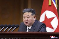 North Korean leader Kim Jong Un speaking during a parliament session