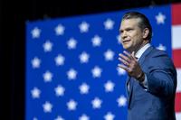 Secretary of War Pete Hegseth delivers remarks during a War Department address at Marine Corps Base Quantico, Va., Sept. 30, 2025. (Department of War/Navy Petty Officer 2nd Class Aiko Bongolan, DOW)