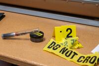 Items used by the Air Force Office of Special Investigations (AFOSI) during crime scene investigations are set on a table. U.S. Air Force photo by Senior Airman Kari Degraffenreed. Source: DVIDS