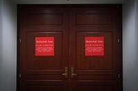 The closed entrance to a secure room is seen where Navy Adm. Frank &quot;Mitch&quot; Bradley, commander of the U.S. Special Operations Command, is expected to brief top congressional lawmakers overseeing national security as they investigate how Defense Secretary Pete Hegseth handled a military strike on a suspected drug smuggling boat and its crew in the Caribbean near Venezuela Sept. 2, at the Capitol in Washington, Thursday, Dec. 4, 2025. (AP Photo/J. Scott Applewhite)