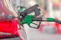 Green Diesel Gas Pump in a Car