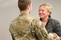 U.S. Army Pvt. First Class Patrick Konczal sees his cancer-ridden mother for the first time in 1 1/2 years. (American Red Cross)