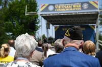 Veterans and families attend a commemoration.