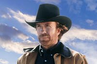 Chuck Norris wearing a cowboy hat against a blue sky background. Courtesy of CBS