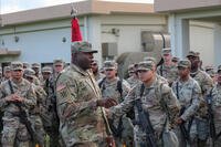 Command Sgt. Maj. John Brown, senior enlisted advisor of the 38th Air Defense Artillery Brigade, provides a rousing speech to the Soldiers of Bravo Battery before departing on a deployment to the United States Central Command area of responsibility on August 19, 2024 at Kadena Air Force Base, Japan. (U.S. Army photos by Capt. Frank Spatt)