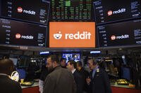 FILE - Reddit Inc. signage is seen on the New York Stock Exchange trading floor, prior to Reddit IPO, Thursday, March. 21, 2024. v(AP Photo/Yuki Iwamura, File)