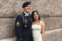This photo provided by Jen Rickling shows U.S. Army staff sergeant, Matthew Blank, left, and his wife, Annie Ramos, posing for a photo while celebrating their wedding, in March, 2026, in Houston. (Jen Rickling via AP)