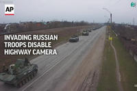 Watch Invading Russian Troops Disable Highway Camera
