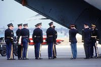 Major Arthur Nicholson's casket is placed on a U.S. aircraft at Rhein-Main Air Base in Germany.