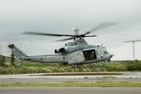 A UH-1Y helicopter lands in preparation for the boarding of Lt. Gen. Michael G. Dana Nov. 5 on Camp Courtney, Okinawa, Japan. (U.S. Marine Corps/Cpl. Janessa Pon)