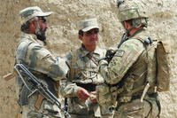 Caption: Two Afghan Border Policemen speak with 1st Lt. Patrick Ryan, with Security Assistance Team 8, during Operation Southern Strike II near the P'sha Pass in Afghanistan. (U.S. Army photo)