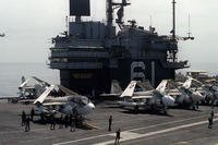 In this 1980 Navy photo an EA-6B Prowler and three A-6E Intruders aircraft are lined up on the flight deck of the aircraft carrier USS Ranger (CV-61).