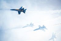 U.S. Navy flight demonstration squadron the Blue Angels perform a high-speed diamond break-away maneuver at the Marine Corps Air Station Miramar Air Show. (U.S. Navy/MC2 Nolan Kahn)