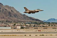 An F-16 Fighting Falcon assigned to the 64th Aggressor Squadron takes off for a training flight Aug. 13, 2013, at Nellis Air Force Base, Nev. (U.S. Air Force photo/Airman 1st Class Joshua Kleinholz)