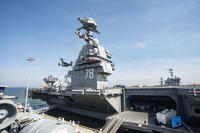 MV-22 Ospreys assigned to the U.S. Presidential Helicopter Squadron land on the flight deck of the aircraft carrier USS Gerald R. Ford during the ship's commissioning ceremony at Naval Station Norfolk, July 22, 2017. (U.S. Navy photo/Andrew J. Sneeringer)