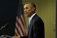 President Obama faces reporters, Wednesday, Aug. 20, 2014 on the island of Martha's Vineyard, to speak about the beheading of journalist James Foley by militants with the Islamic State extremist group. (AP Photo/Steven Senne)