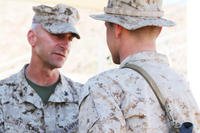 Col. Matthew G. St. Clair, commanding officer of Ground Combat Element Integrated Task Force, presents Lance Cpl. Nicholas J. Cascone with a Navy and Marine Corps Achievement Medal. (U.S. Marine Corps photo: Cpl. Paul S. Martinez)