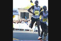 In this file photo, Spc. Paul Chelimo, left, wins the Army Ten-Miler, Oct. 11, 2015, with a time of 48:19, less than a step ahead of his teammate Spc. Nicholas Kipruto. (U.S. Army/David Vergun)