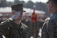 Cpl. Joseph Currey, left, salutes Lt. Col. Jeremy Winters, right, during an award ceremony at Marine Corps Air Station Cherry Point, North Carolina, March 1, 2016. (Photo: Lance Cpl. Austin Lewis)