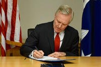 Secretary of the Navy (SECNAV) Ray Mabus signs an administrative separation (ADSEP), June 1, 2016. (U.S. Navy photo/Chief Mass Communication Specialist Sam Shavers)