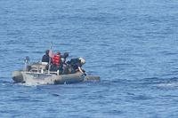 A small boat from the USS Princeton recovered a bale of drugs.
