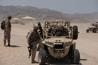 Members of 3rd Battalion, 5th Marines, mount up on the Polaris MRZR during Marine Integrated Experiment 2016 at Marine Corps Air Ground Combat Center Twentynine Palms, Calif., July 31, 2016. Sgt. Cuong Le/Marine Corps