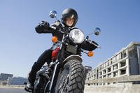 Motorcycle being driven on a road.