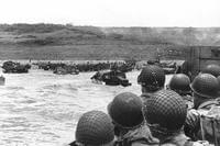 US troops prepare to attack during the Normandy invasion on June 6, 1944. More than 160,000 American troops landed in France that day; Warren McDonough, who died at age 91, was one of them. (DoD photo)
