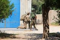 Soldiers from 3rd Brigade Combat Team, 101st Airborne Division and Afghan National Army troops from 201st Corps conduct a partnered force protection patrol in Laghman province Sept. 23, 2015. (U.S. Army photo by Capt. Jarrod Morris)