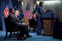 First lady Michelle Obama delivering an announcement at a podium.