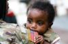 Army soldier with baby