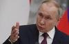 Russian President Vladimir Putin speaks during a news conference in Moscow