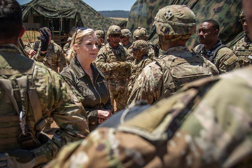 Christine Wormuth, U.S. Secretary of the Army, center, recognizes 4th Infantry Division soldiers