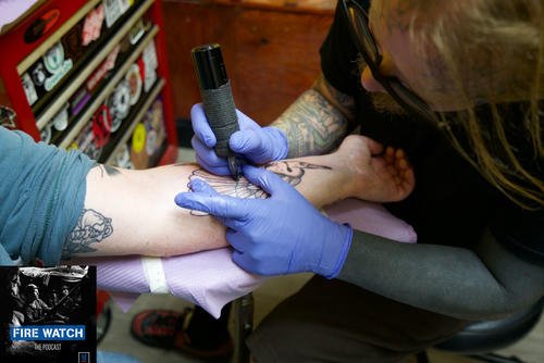 Fire Watch Host, Drew F. Lawrence gets tattooed at the Baltimore Tattoo Museum.