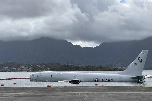 Navy P-8A plane that overshot a runway at Marine Corps Base Hawaii and landed in shallow water offshore