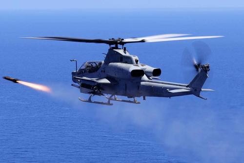 U.S. Marine Corps AH-1Z fires an AGM-179 joint air-to-ground munition