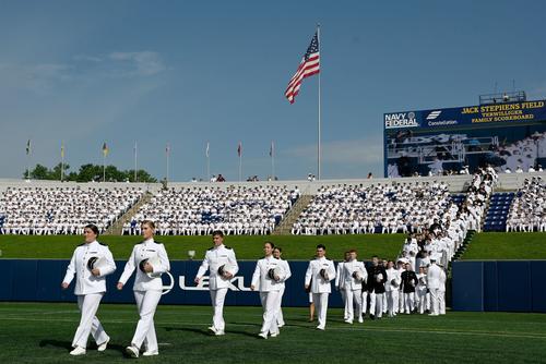 The procession of graduating midshipmen at the Naval Academy.