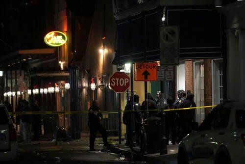 Emergency services attend the scene after a vehicle drove into a crowd in New Orleans.