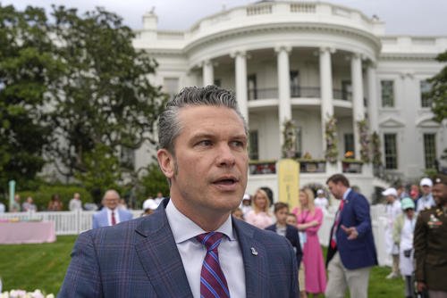 Defense Secretary Pete Hegseth speaks on the South Lawn of the White House
