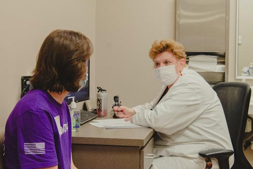 Medical provider conducts a medical evaluation with an applicant